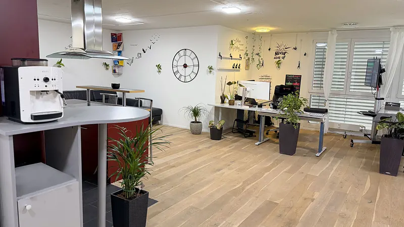 Coffee bar overlooking the workstations in the Webzenz office