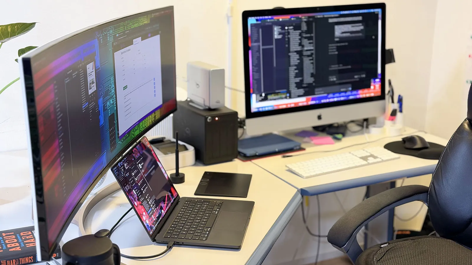 Developer workstation with several monitors at Webzenz